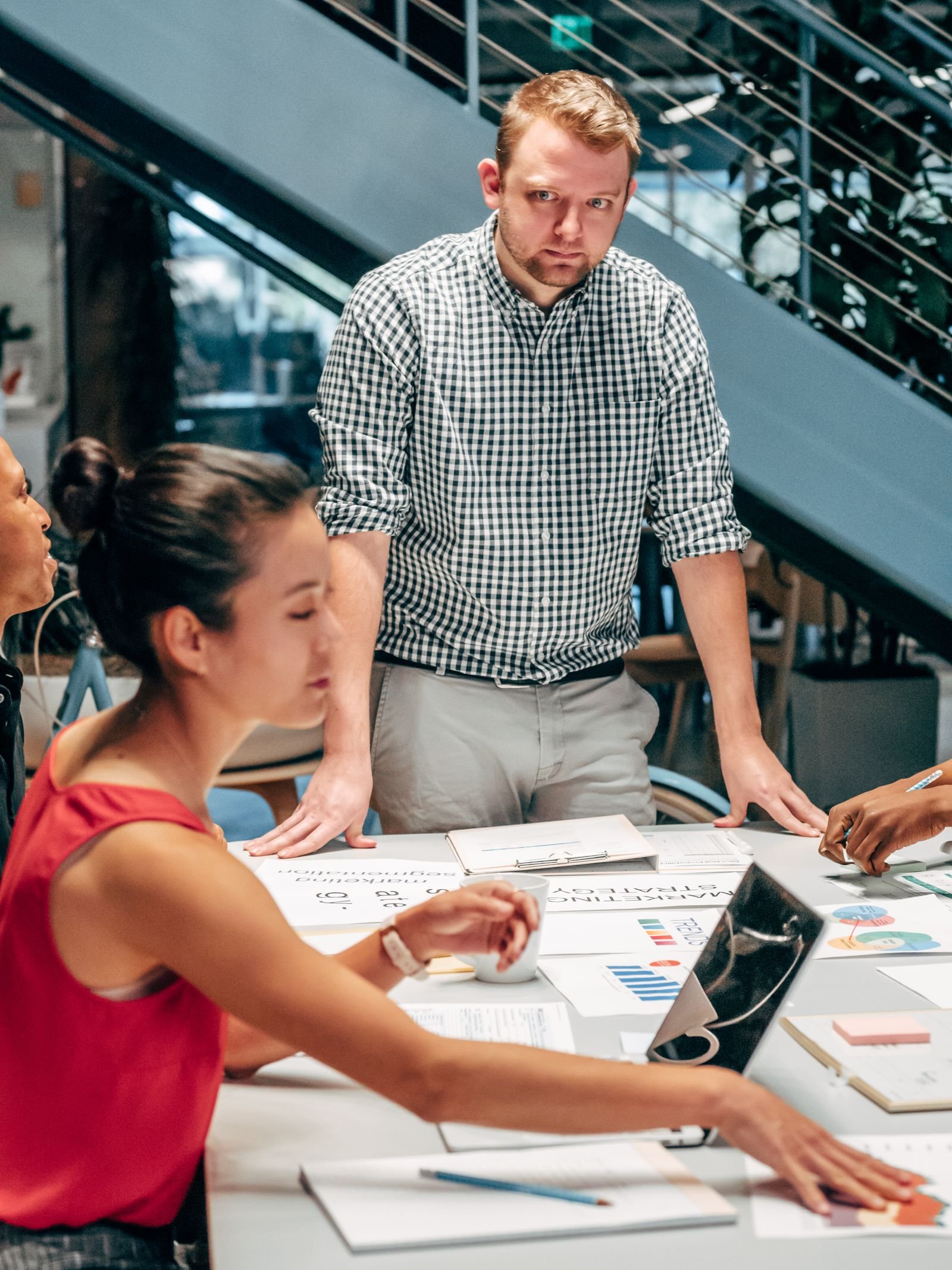 Business team engaged in a strategy meeting at a modern workspace